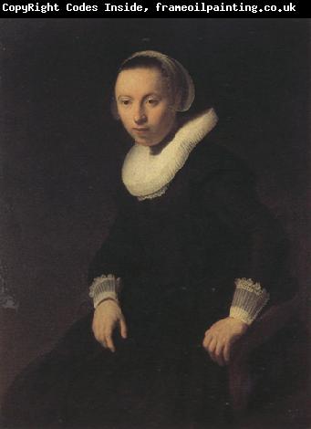 REMBRANDT Harmenszoon van Rijn Portrait of a young woman seted, (mk330